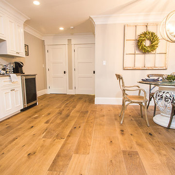 Quaint Kitchen & Living Room with Sierra Wide Planking Flooring by Sawyer Mason