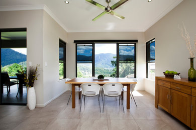 Design ideas for a contemporary dining room in Cairns.