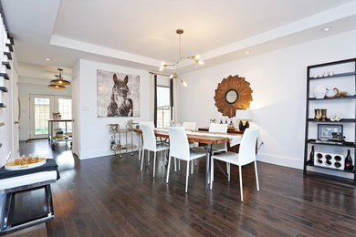 Example of a transitional dining room design in Toronto