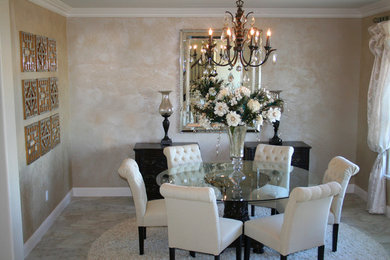 Example of a mid-sized transitional light wood floor and beige floor enclosed dining room design in Sacramento with beige walls