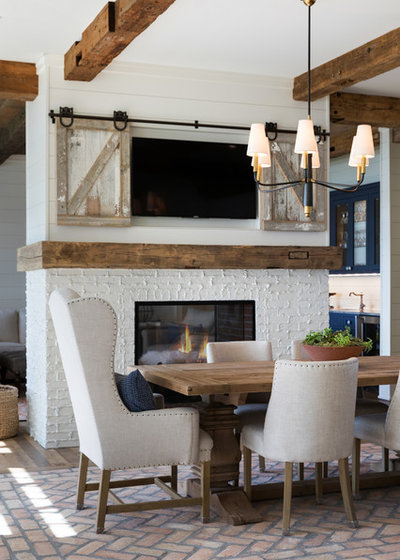 Beach Style Dining Room by Lenox House Design