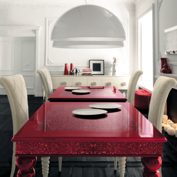Red dining table with white high-backed chairs by AltaModa