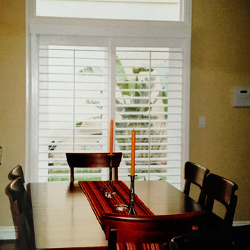 Redondo Beach, CA -  Shutter covering lower rectangle portiono of window - leavi