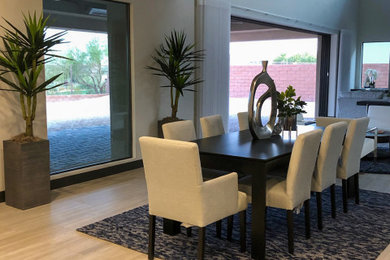 Example of a minimalist dining room design in Las Vegas