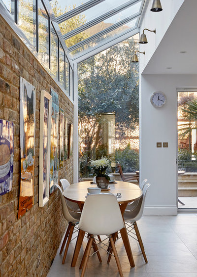 Transitional Dining Room by Hampstead Design Hub