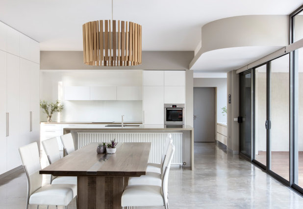 Contemporary Dining Room by Lume Architecture