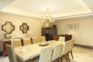 Design ideas for a contemporary dining room in Delhi.