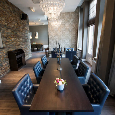 Inspiration for a contemporary dark wood floor dining room remodel in Amsterdam