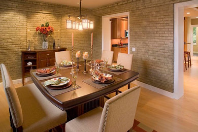 Mid-sized transitional light wood floor enclosed dining room photo in St Louis with beige walls