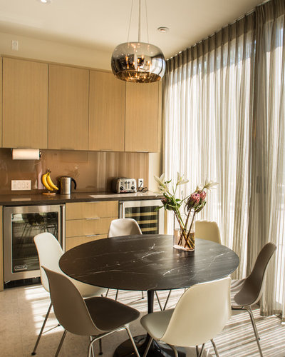 Contemporary Dining Room by Tuggey Construction