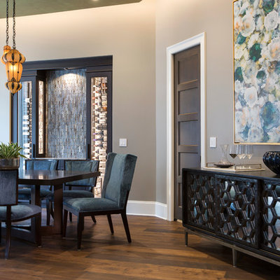 Enclosed dining room - mid-sized contemporary medium tone wood floor enclosed dining room idea in Jacksonville with gray walls and no fireplace