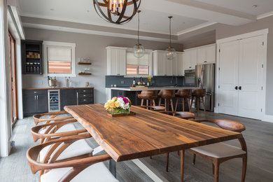 Example of a mid-sized transitional dark wood floor great room design in Los Angeles with gray walls