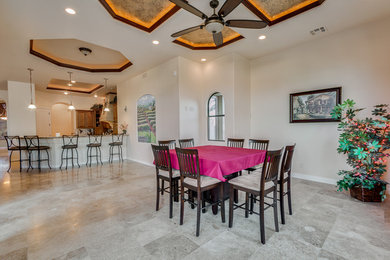 Example of a tuscan dining room design in Phoenix