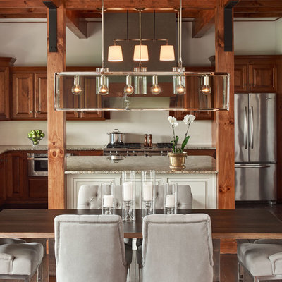Mountain style kitchen/dining room combo photo in Charlotte with white walls