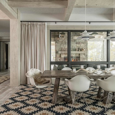 Inspiration for a rustic light wood floor dining room remodel in Other with white walls