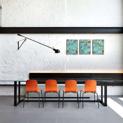 Inspiration for a contemporary dining room remodel in DC Metro with white walls
