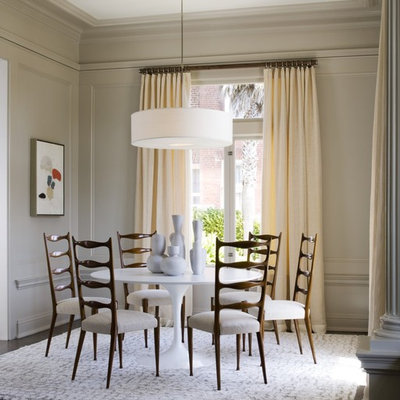 Trendy dark wood floor dining room photo in San Francisco with beige walls