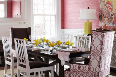 Inspiration for a transitional dining room remodel in Seattle with pink walls
