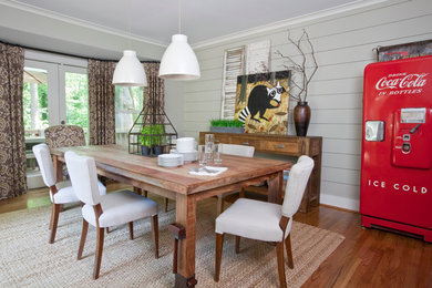 Dining room - cottage medium tone wood floor dining room idea in Atlanta with gray walls
