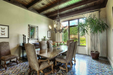 Inspiration for a mediterranean dining room remodel in Austin