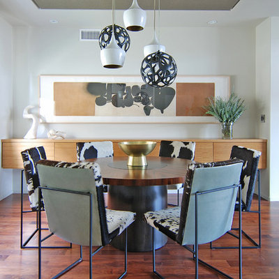 Dining room - contemporary dark wood floor dining room idea in Los Angeles with white walls