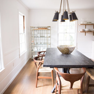 Kitchen/dining room combo - scandinavian light wood floor kitchen/dining room combo idea in Sacramento with white walls and no fireplace