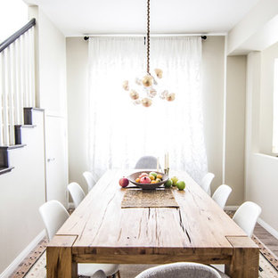 Inspiration for a small scandinavian dining room remodel in Orange County with white walls and no fireplace