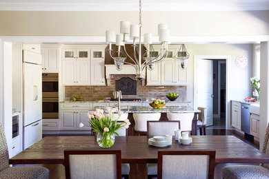 Kitchen/dining room combo - large farmhouse kitchen/dining room combo idea in Chicago with beige walls