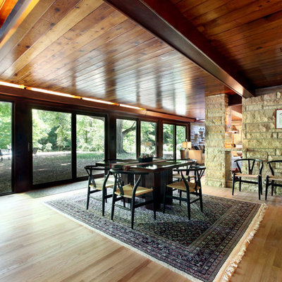 Inspiration for a contemporary light wood floor dining room remodel in Grand Rapids