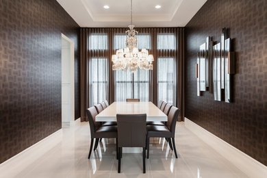 Inspiration for a contemporary enclosed dining room remodel in Miami with brown walls and no fireplace