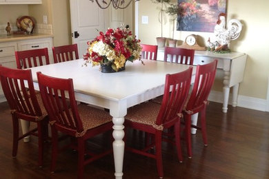 Example of a cottage chic dining room design in Orange County