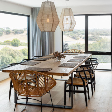 Large Fixed Window and Awning Window in a dining room