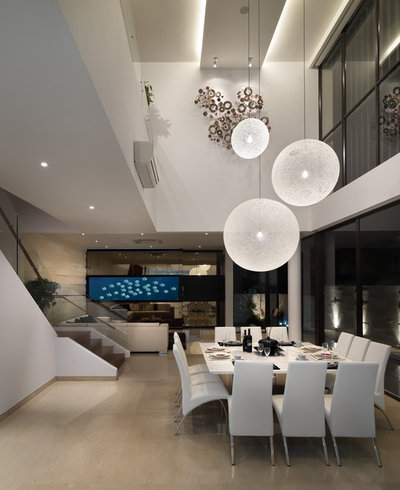 Contemporary Dining Room by The Interior Place (S) Pte Ltd