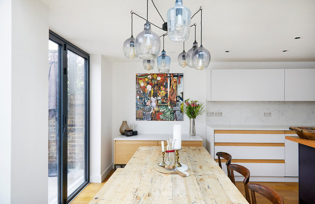 Contemporary Dining Room by Kia Designs