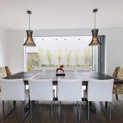 Trendy dining room photo in Sydney with white walls