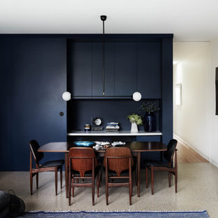 This is an example of a contemporary dining room in Melbourne.