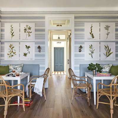 Small beach style dark wood floor dining room photo in Jacksonville with multicolored walls