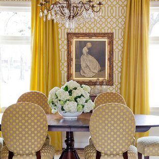 Design ideas for a mid-sized contemporary dining room in Little Rock with yellow walls and medium hardwood floors.