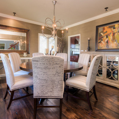 Dining room - transitional dark wood floor dining room idea in Denver