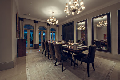 Expansive classic enclosed dining room in Other with beige walls, marble flooring and no fireplace.