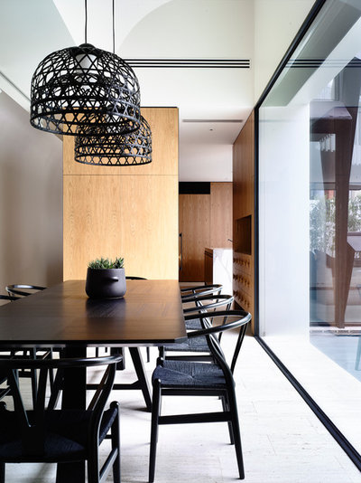 Contemporary Dining Room by Kennedy Nolan