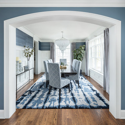 Inspiration for a transitional medium tone wood floor and brown floor enclosed dining room remodel in Chicago