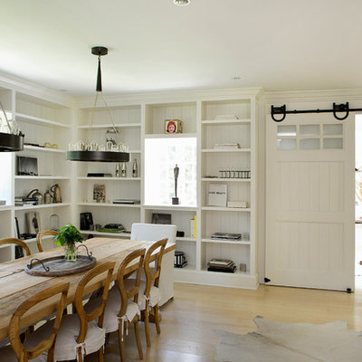 Inspiration for a large country light wood floor and beige floor dining room remodel in New York with white walls and no fireplace