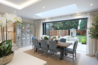 Large classic kitchen/dining room in Surrey with porcelain flooring and white floors.