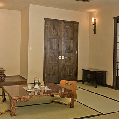 Example of a small asian dining room design in Denver with beige walls