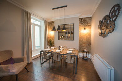 This is an example of a contemporary dining room in London.