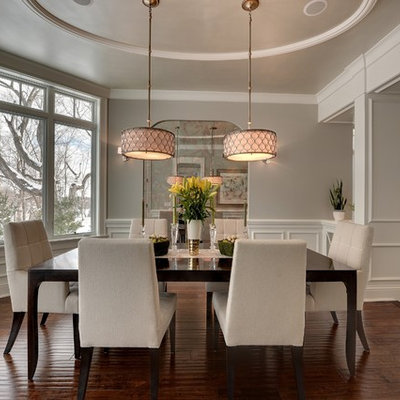 Elegant dark wood floor and brown floor dining room photo in Minneapolis with gray walls