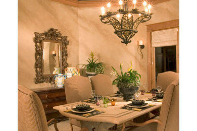 Photo of a large mediterranean enclosed dining room in Seattle with beige walls and carpet.