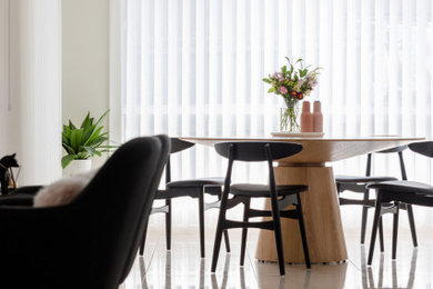 This is an example of a scandi dining room in Other.