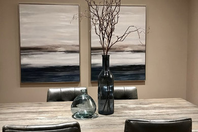 Example of a transitional dining room design in Calgary